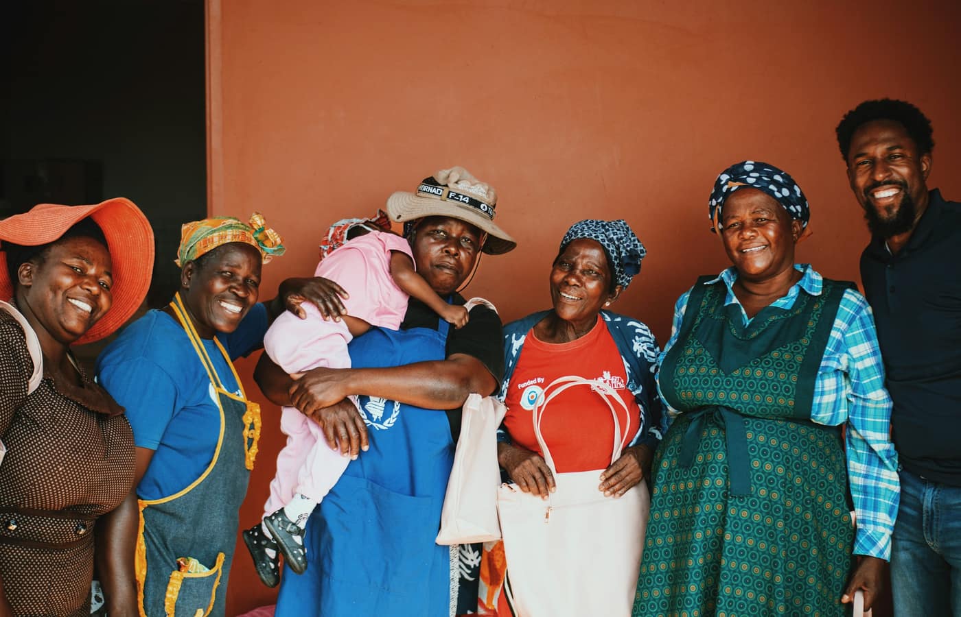 A group of people talking and laughing together